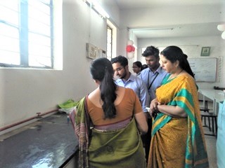 Students briefing their project to the Head of the Institution
